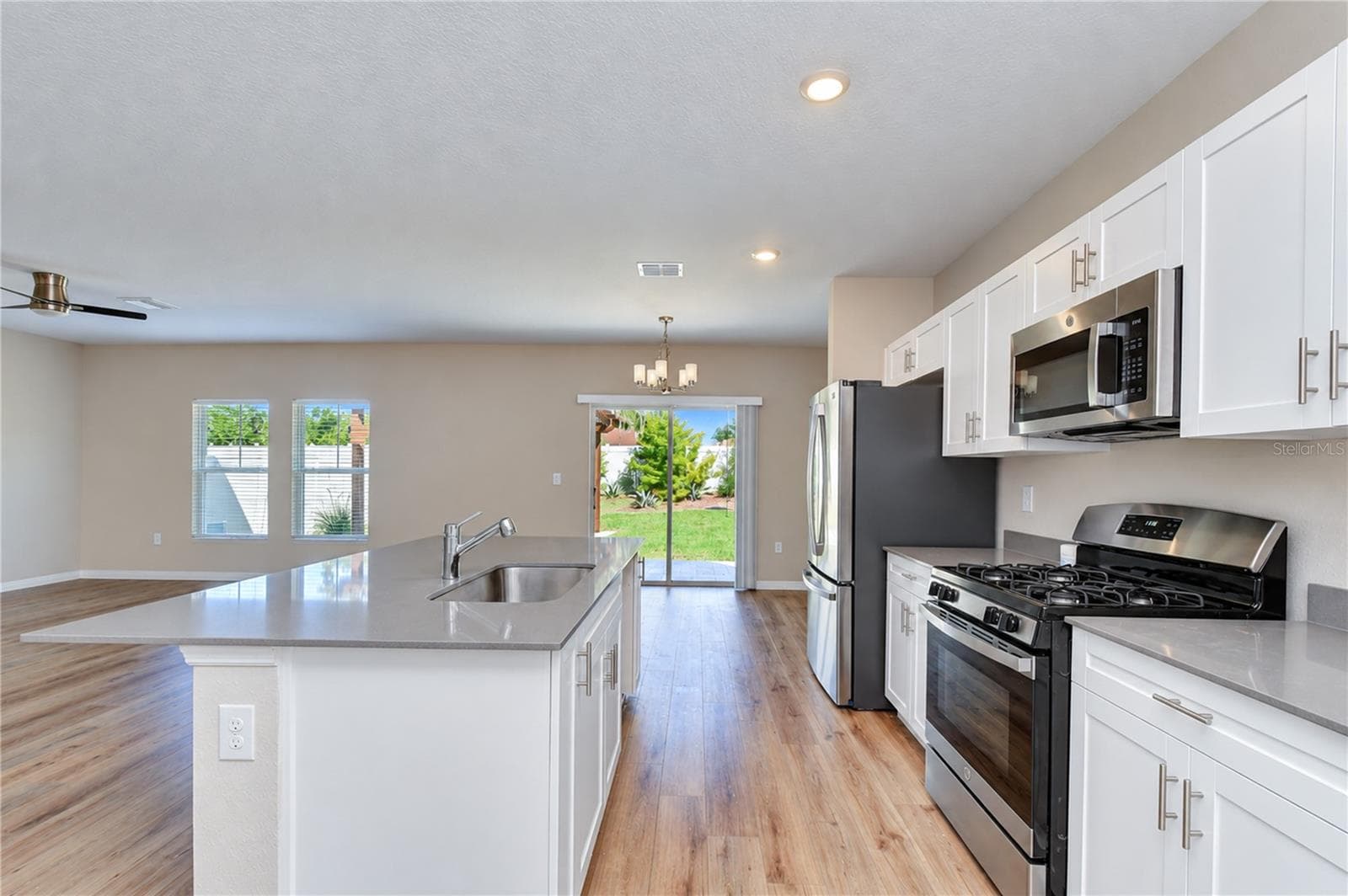 Attractive surfaces offering generous room for meal preparation. - 11484 BROOK EDGE AVE, RIVERVIEW