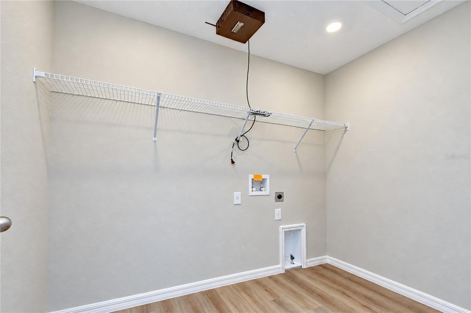 Convenient upstairs laundry space designed to simplify daily routines. - 11484 BROOK EDGE AVE, RIVERVIEW