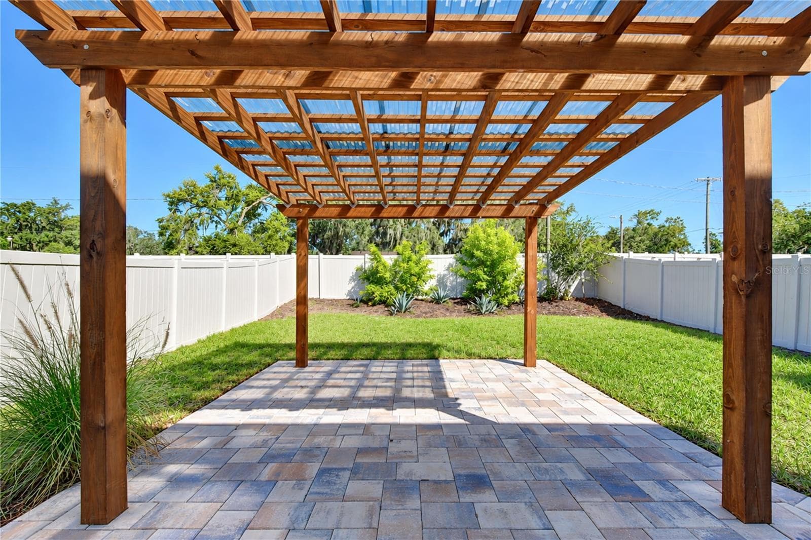 Attractive backyard feature creating a comfortable outdoor gathering spot. - 11484 BROOK EDGE AVE, RIVERVIEW