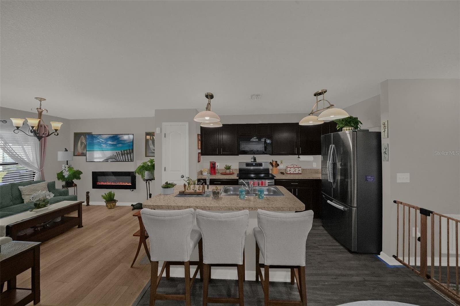 Open concept kitchen and living area - 26448 BERTRAM RD, BROOKSVILLE