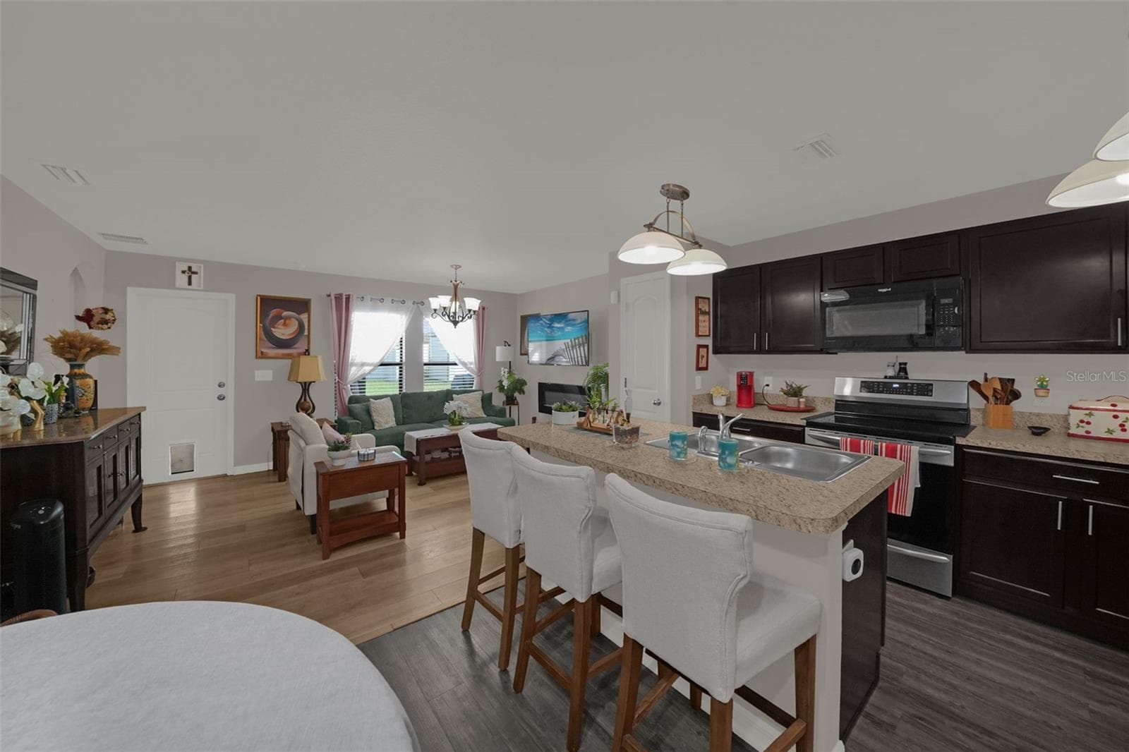 Kitchen with island and breakfast bar - 26448 BERTRAM RD, BROOKSVILLE
