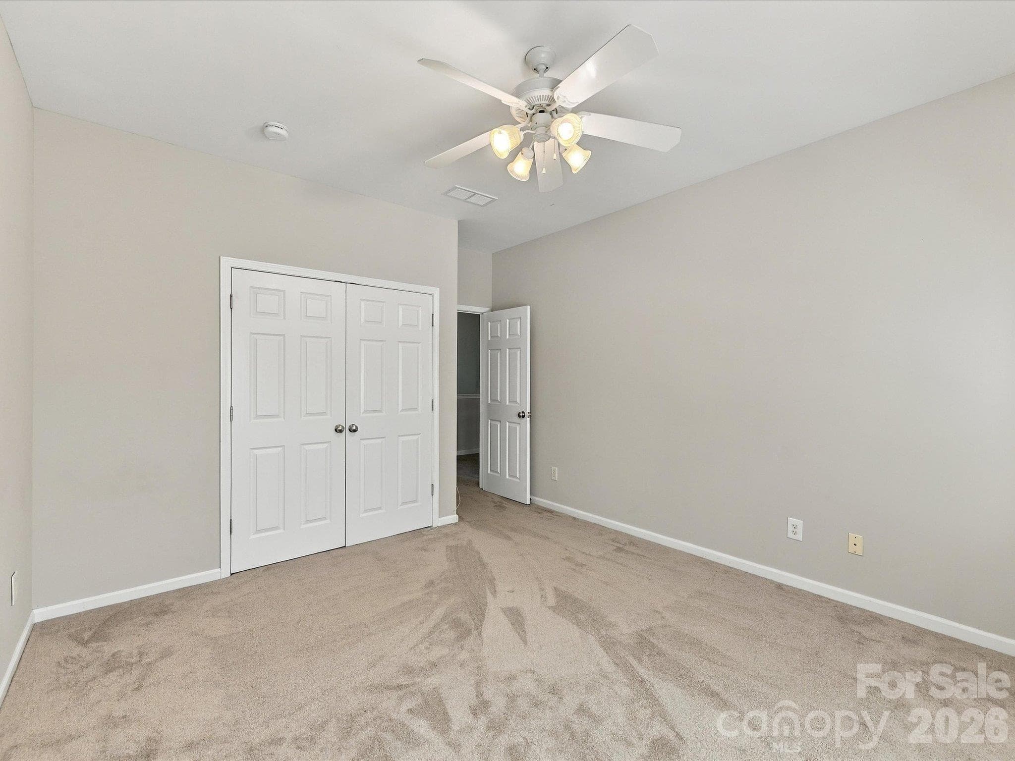 Well-sized bedroom with a flexible layout, abundant natural light, and endless potential to personalize the space to fit your needs. - 1788 Oakmont Drive, Denver