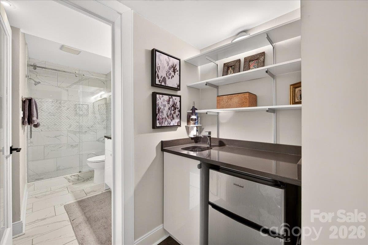 Lower Level Wet Bar with Beverage Refrigerator - 3762 Winding Creek Lane, Charlotte