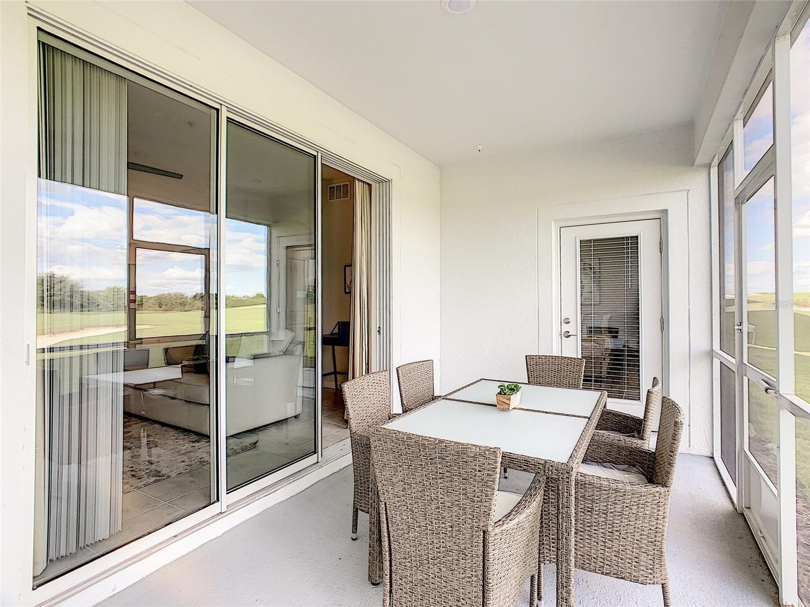Screened Patio Seating - 763 OCEAN COURSE AVE., CHAMPIONS GATE