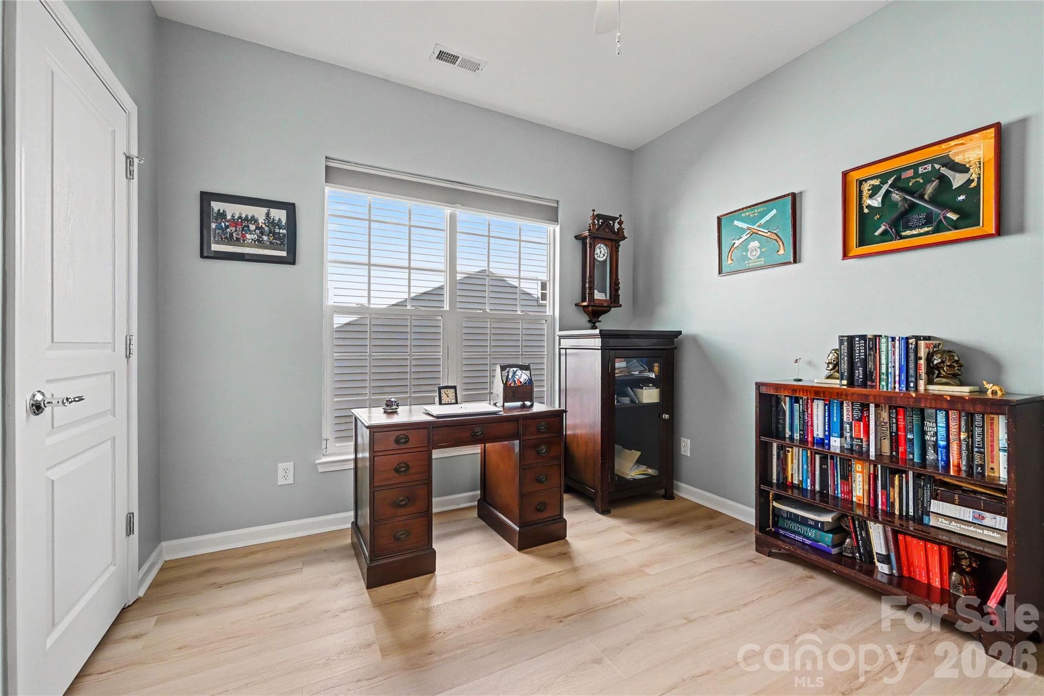 Second Bedroom that can be used as an office features large closet, LVP flooring and neutral paint. - 3054 Azalea Drive, Indian Land