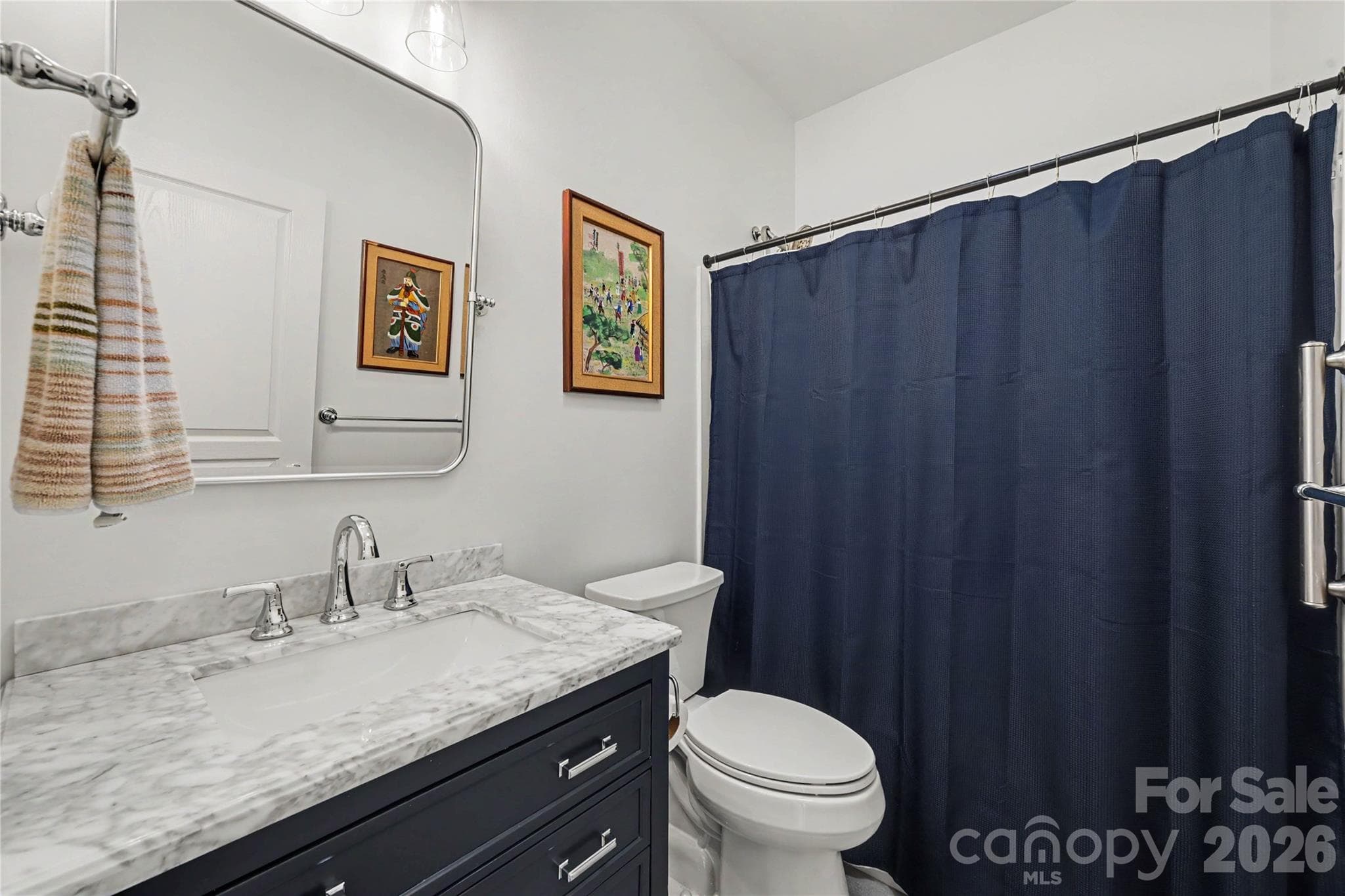 Hall Bathroom features Tile Flooring, New Vanity and fixtures, and neutral paint. - 3054 Azalea Drive, Indian Land