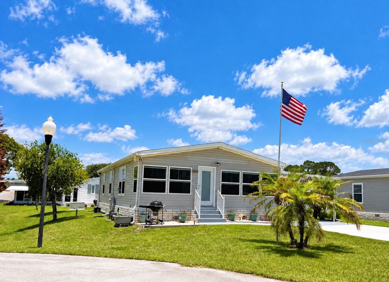 Manufactured Home at 165 SAGO PALM DR, LEESBURG, photo 4 of 63
