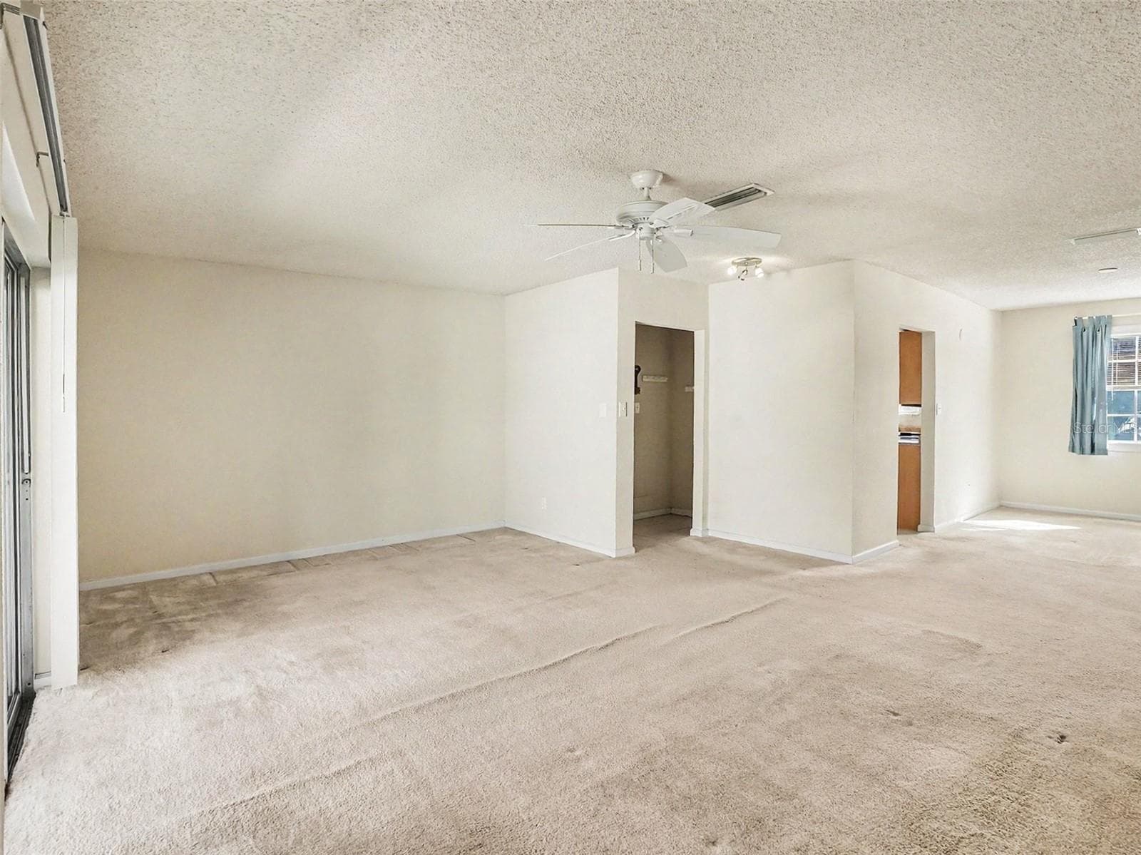 View of Living/Dining Areas - 216 LEWFIELD CIR #216, WINTER PARK