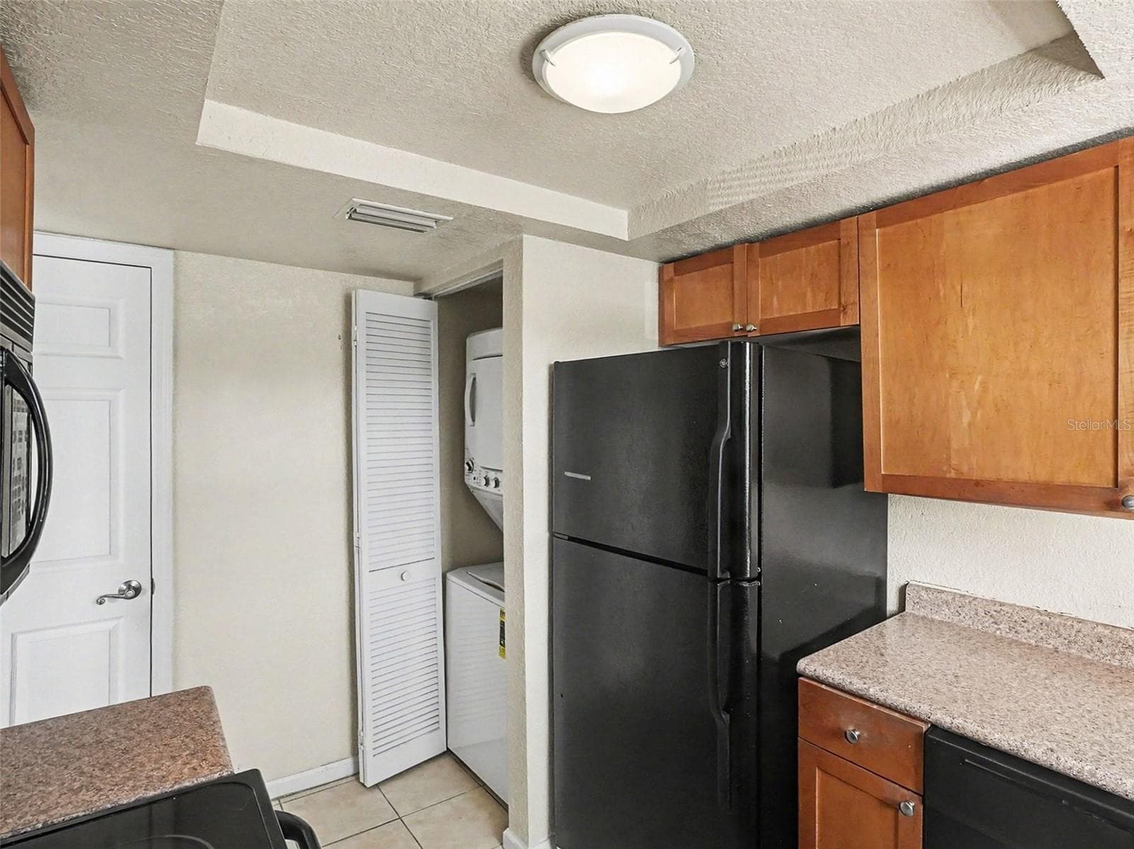 Kitchen-Laundry Closet - 216 LEWFIELD CIR #216, WINTER PARK