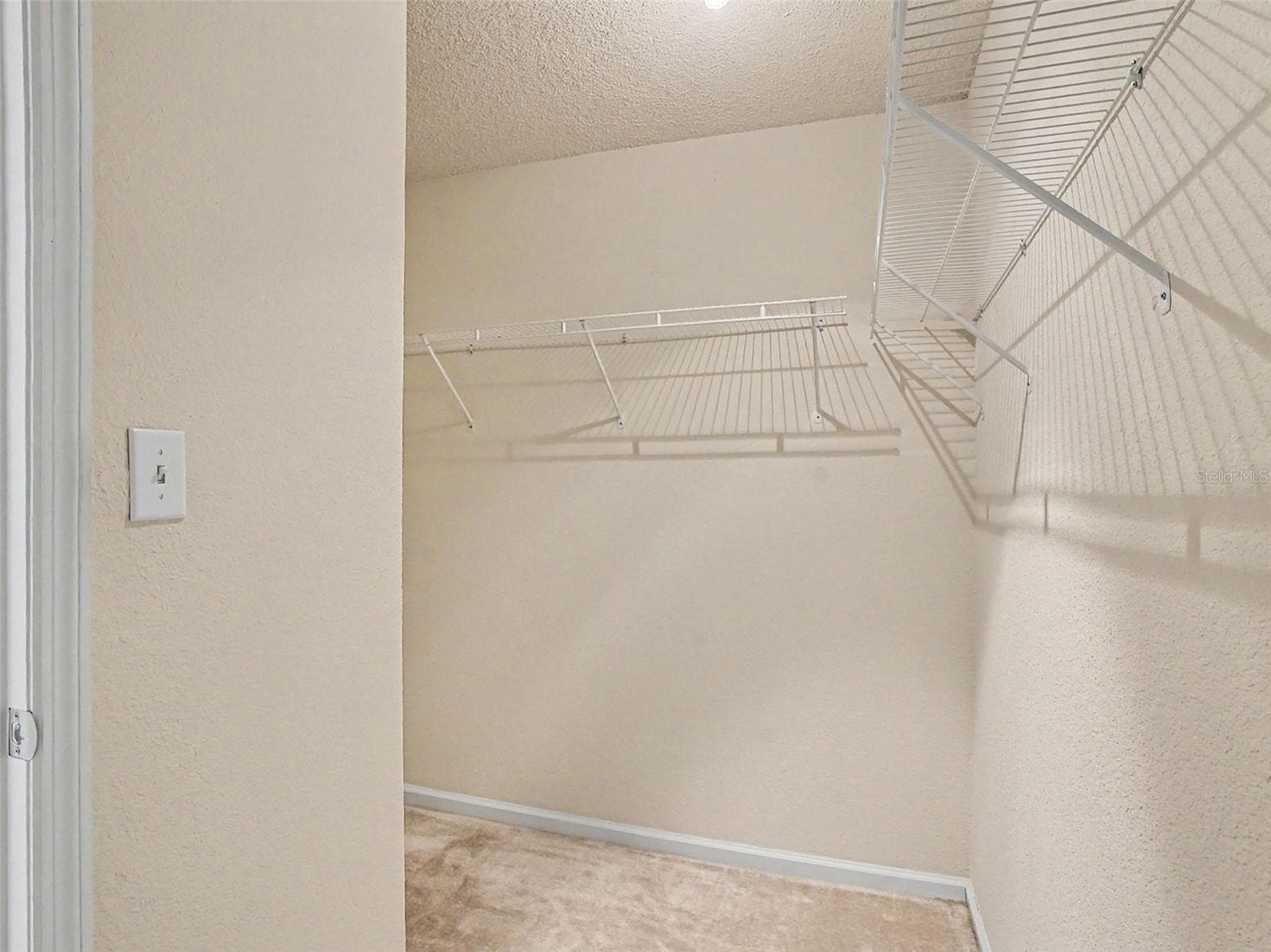 Primary BR Walk in Closet - 216 LEWFIELD CIR #216, WINTER PARK
