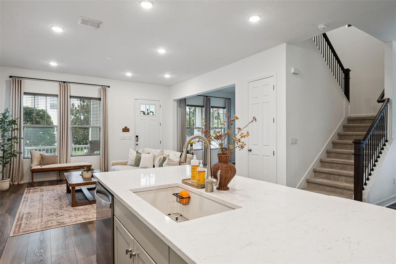 Kitchen Overlooks Living and Dining Rooms - 7313 TIDEPOOL PL, CELEBRATION