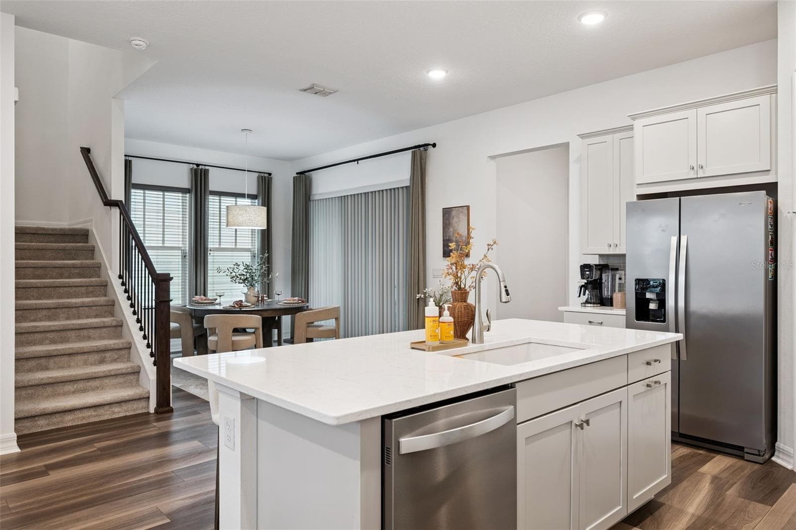 Kitchen Overlooks Living and Dining Rooms - 7313 TIDEPOOL PL, CELEBRATION