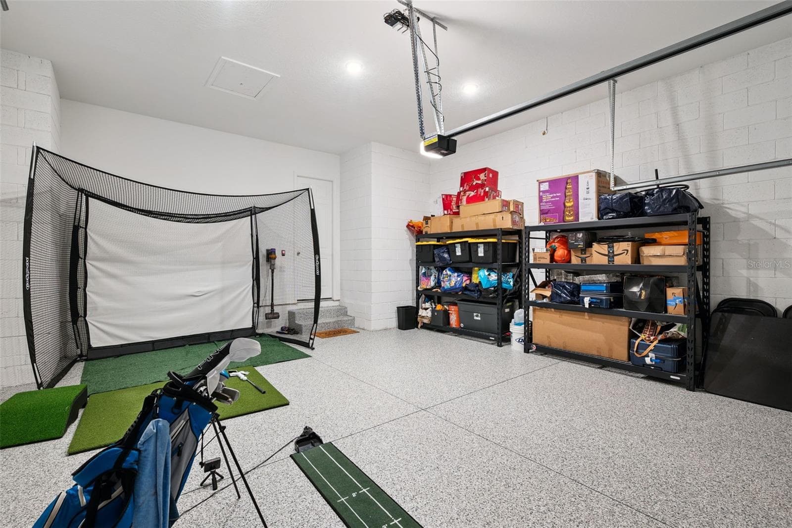 Garage with Epoxied Flooring - 7313 TIDEPOOL PL, CELEBRATION