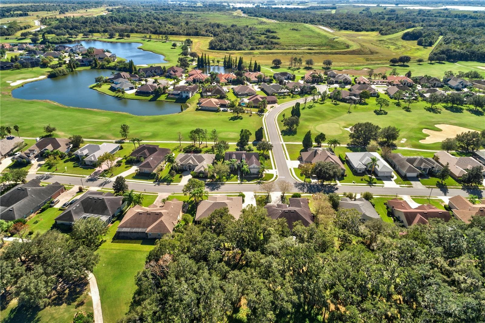 This sprawling 18-hole semi-private golf course is owned by all of the Eaglebrooke property owner's and professionally managed. - 6562 EAGLE VIEW LOOP, LAKELAND