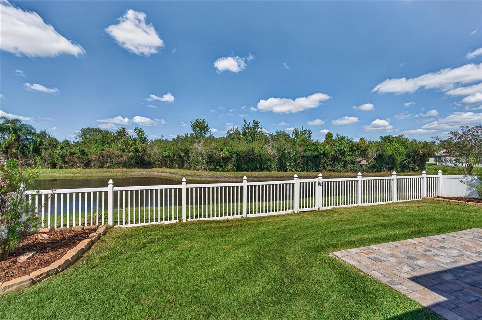 BACKYARD VIEW - 1750 LEYBOURNE LOOP, WESLEY CHAPEL