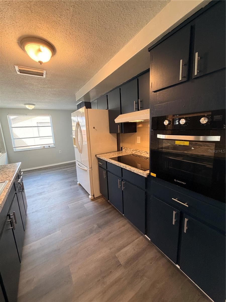 Single Family Residence at 5604 CHEYENNE DR, HOLIDAY, photo 6 of 18