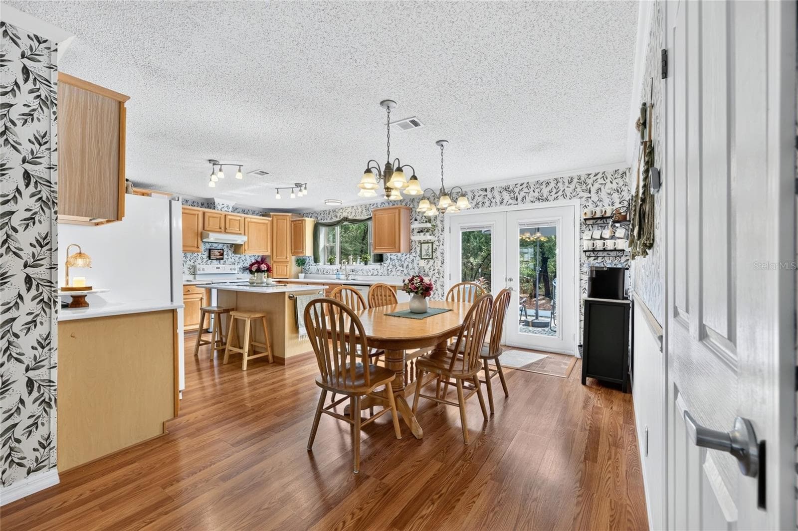 Dining room with french doors to sundeck - 12647 SE 102ND AVE, BELLEVIEW