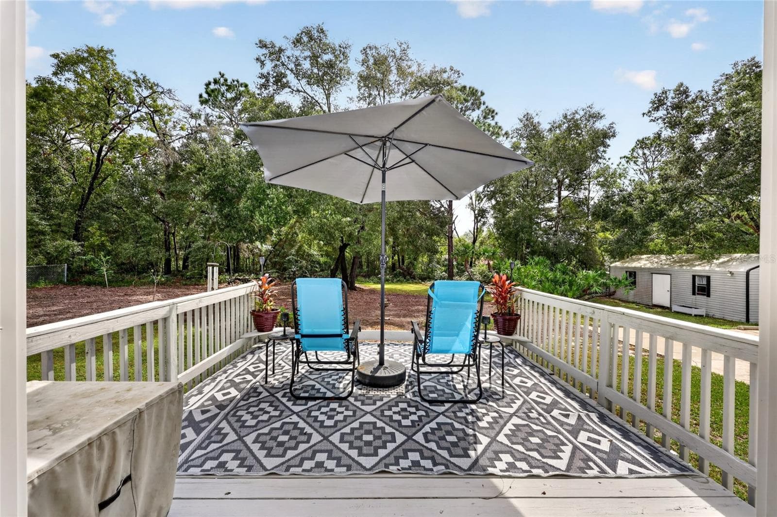 Outdoor deck extends the living space. - 12647 SE 102ND AVE, BELLEVIEW