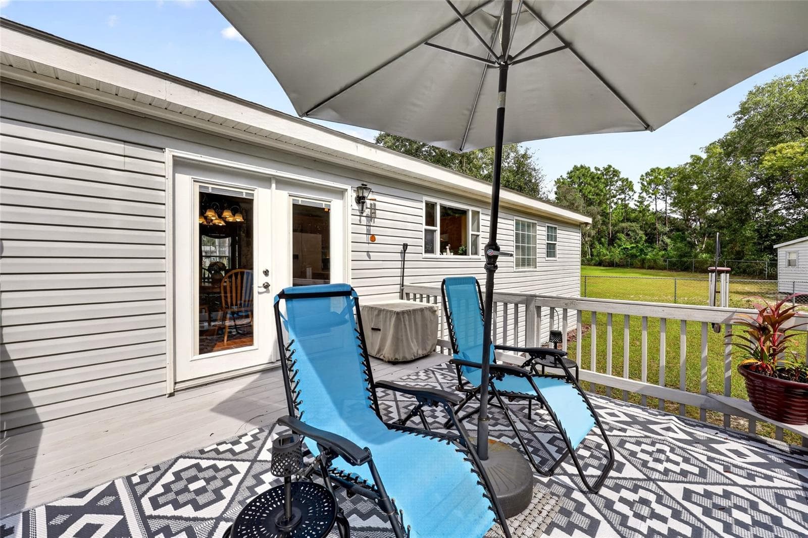 Outdoor deck overlooking the backyard - 12647 SE 102ND AVE, BELLEVIEW