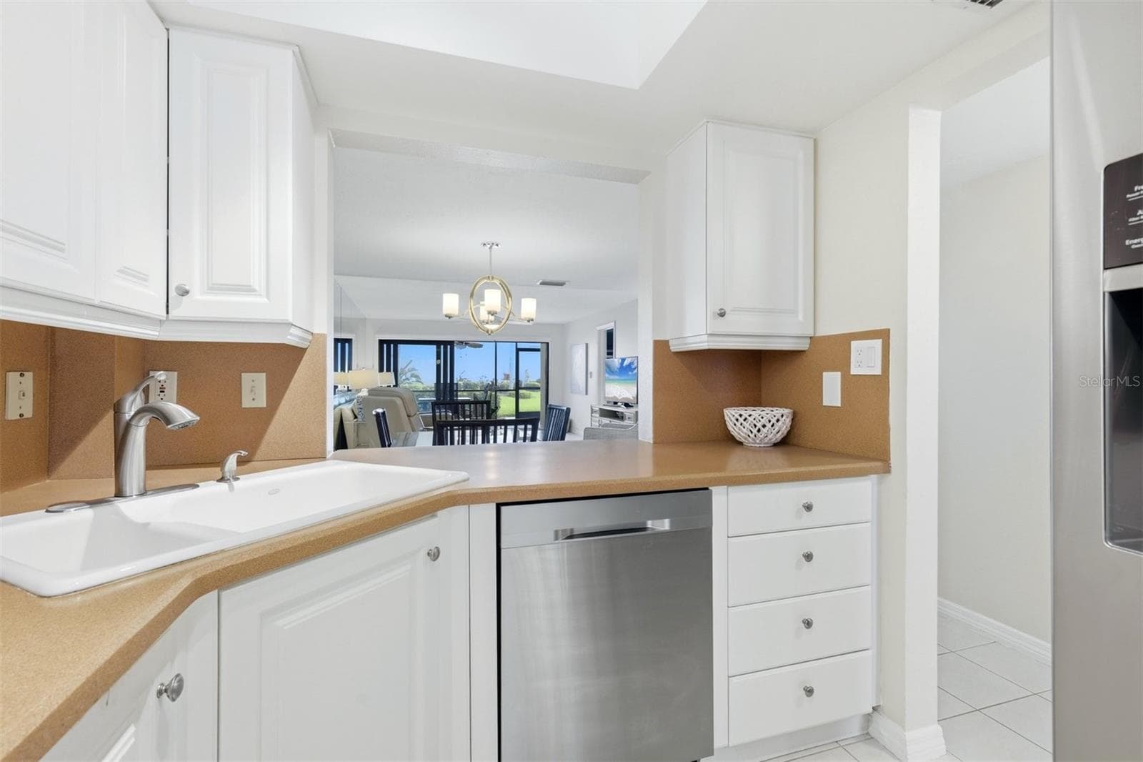 Pass through kitchen with water views - 5655 GULF OF MEXICO DR #A107, LONGBOAT KEY