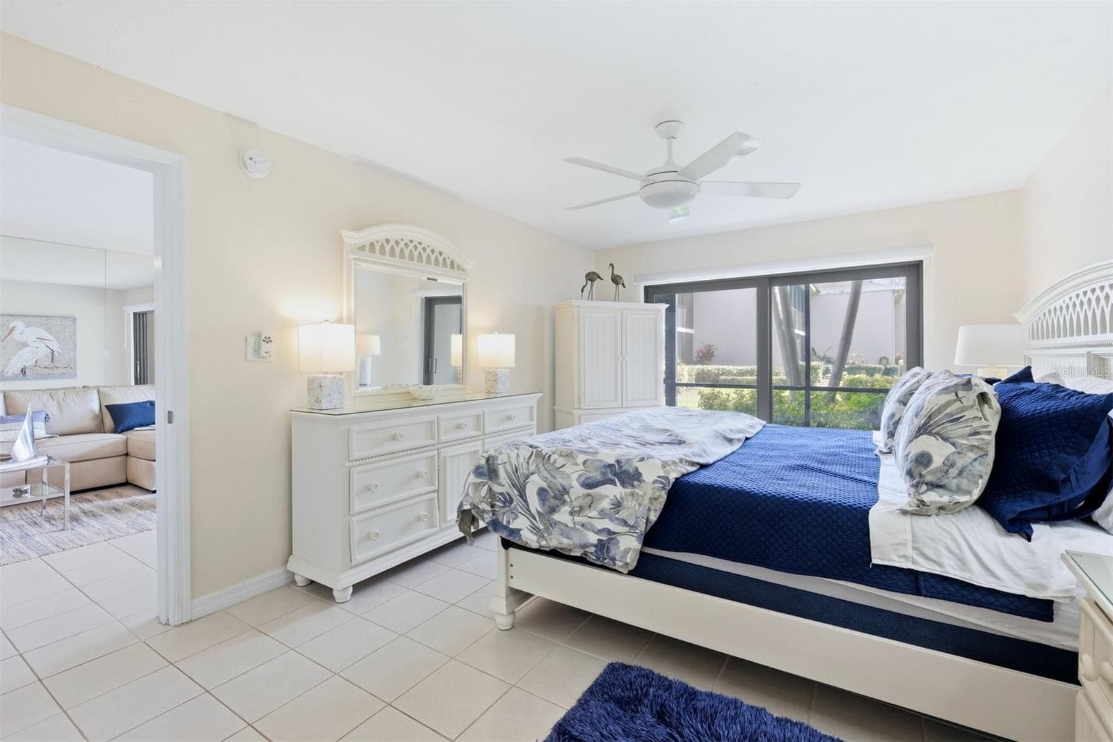 Primary bedroom with impact rated slider to lanai - 5655 GULF OF MEXICO DR #A107, LONGBOAT KEY