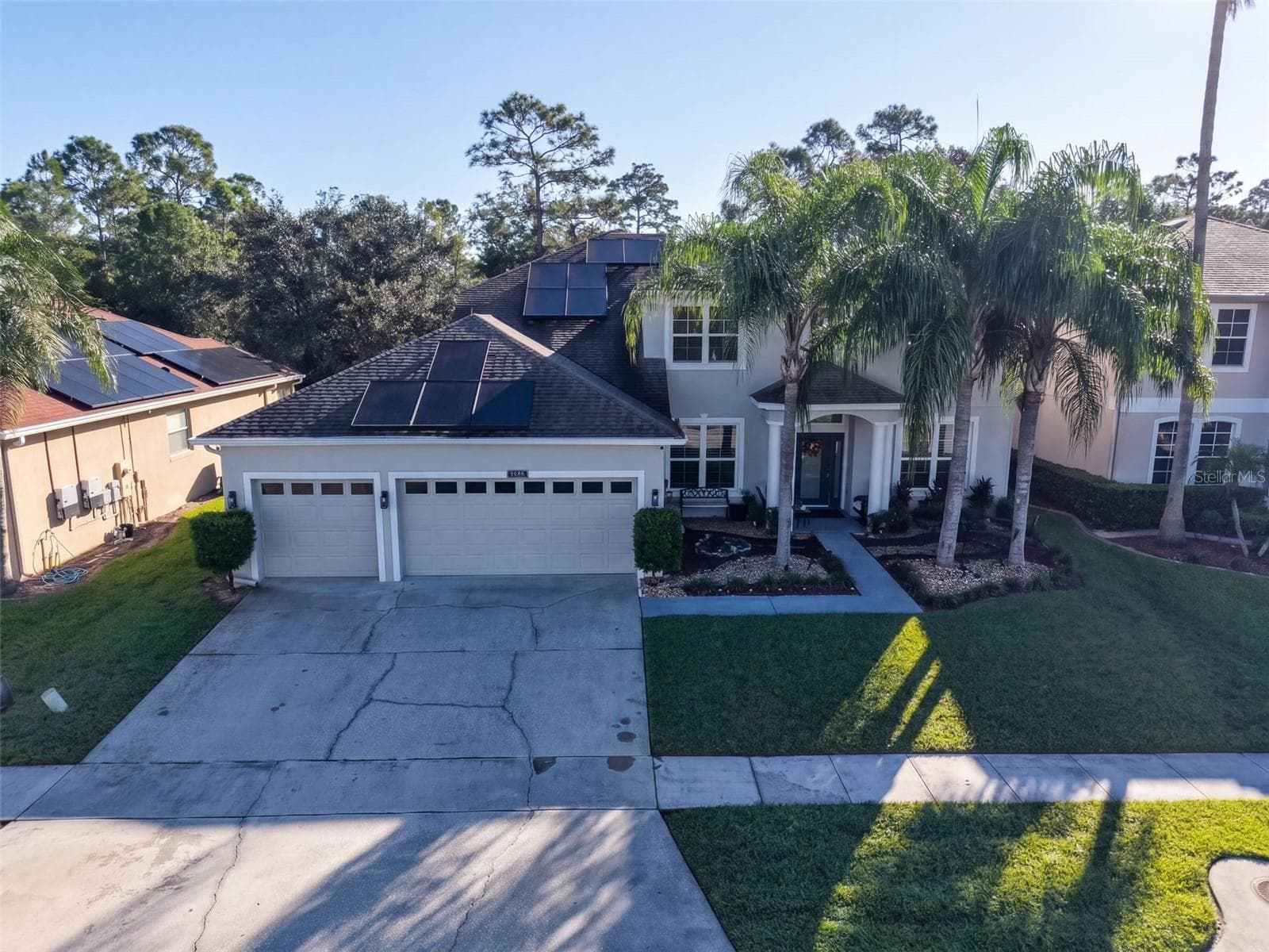 Front Elevation showing solar panels - 10603 SUNRISE TERRACE DR, ORLANDO