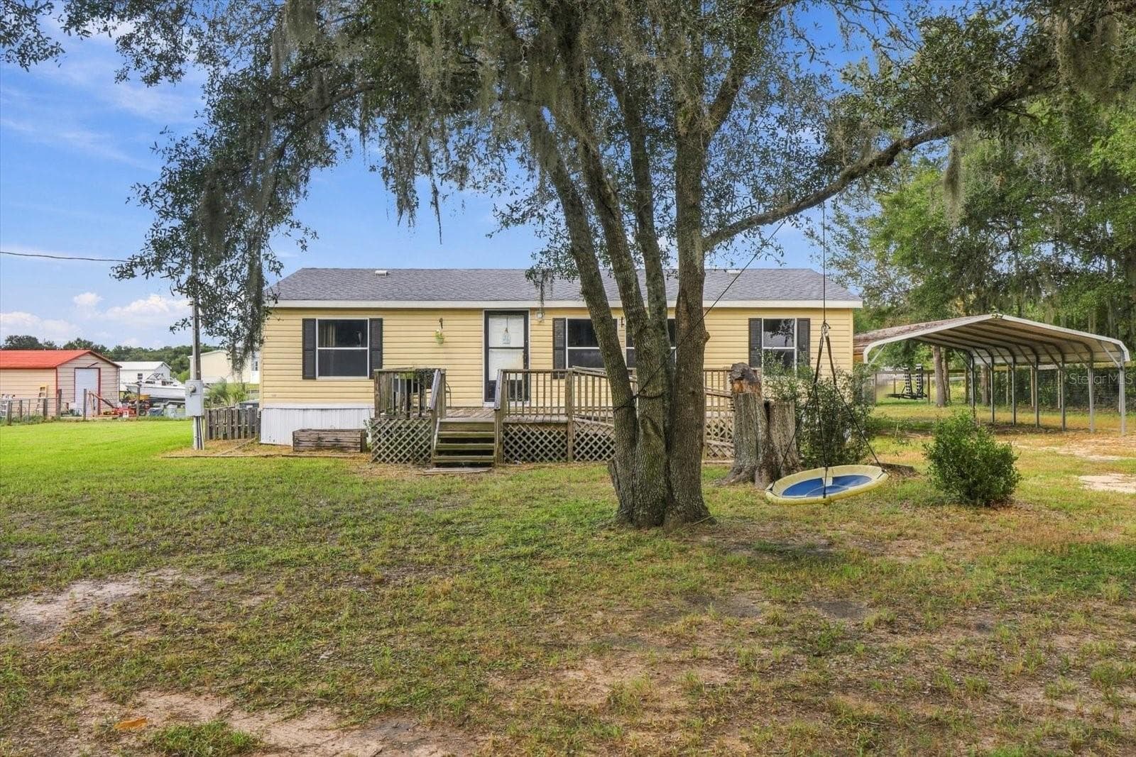 Manufactured Home at 7651 E DERBY OAKS DR, FLORAL CITY, photo 2 of 27