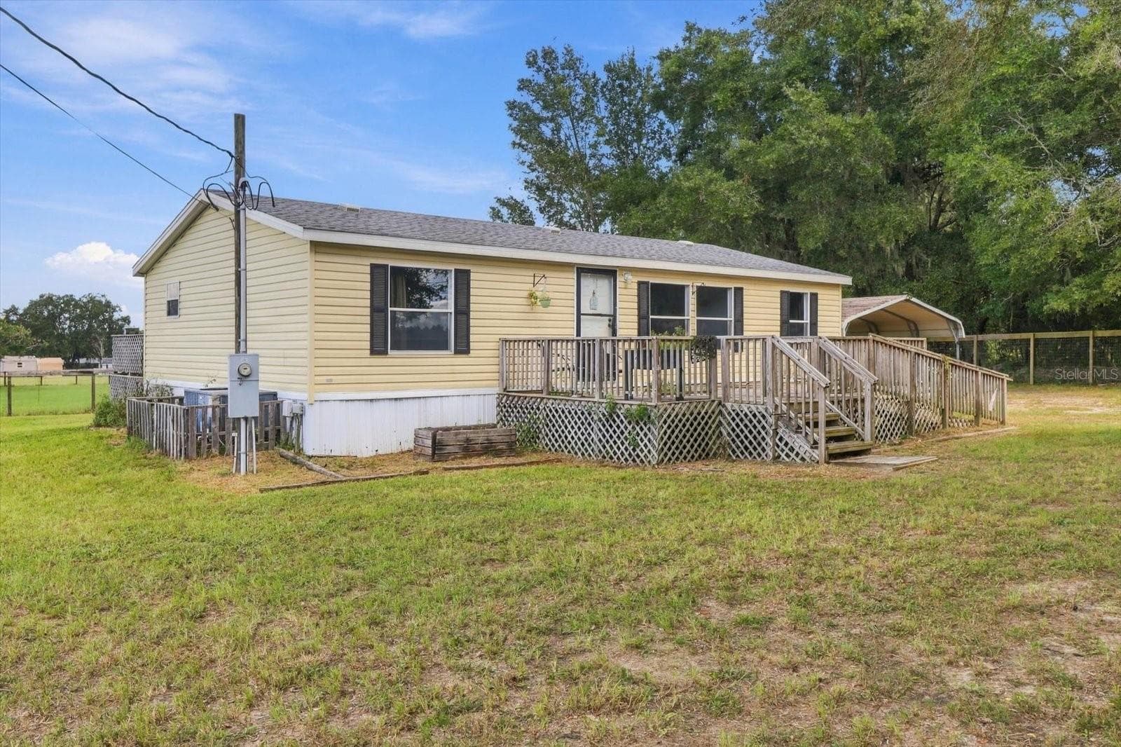 Manufactured Home at 7651 E DERBY OAKS DR, FLORAL CITY, photo 4 of 27