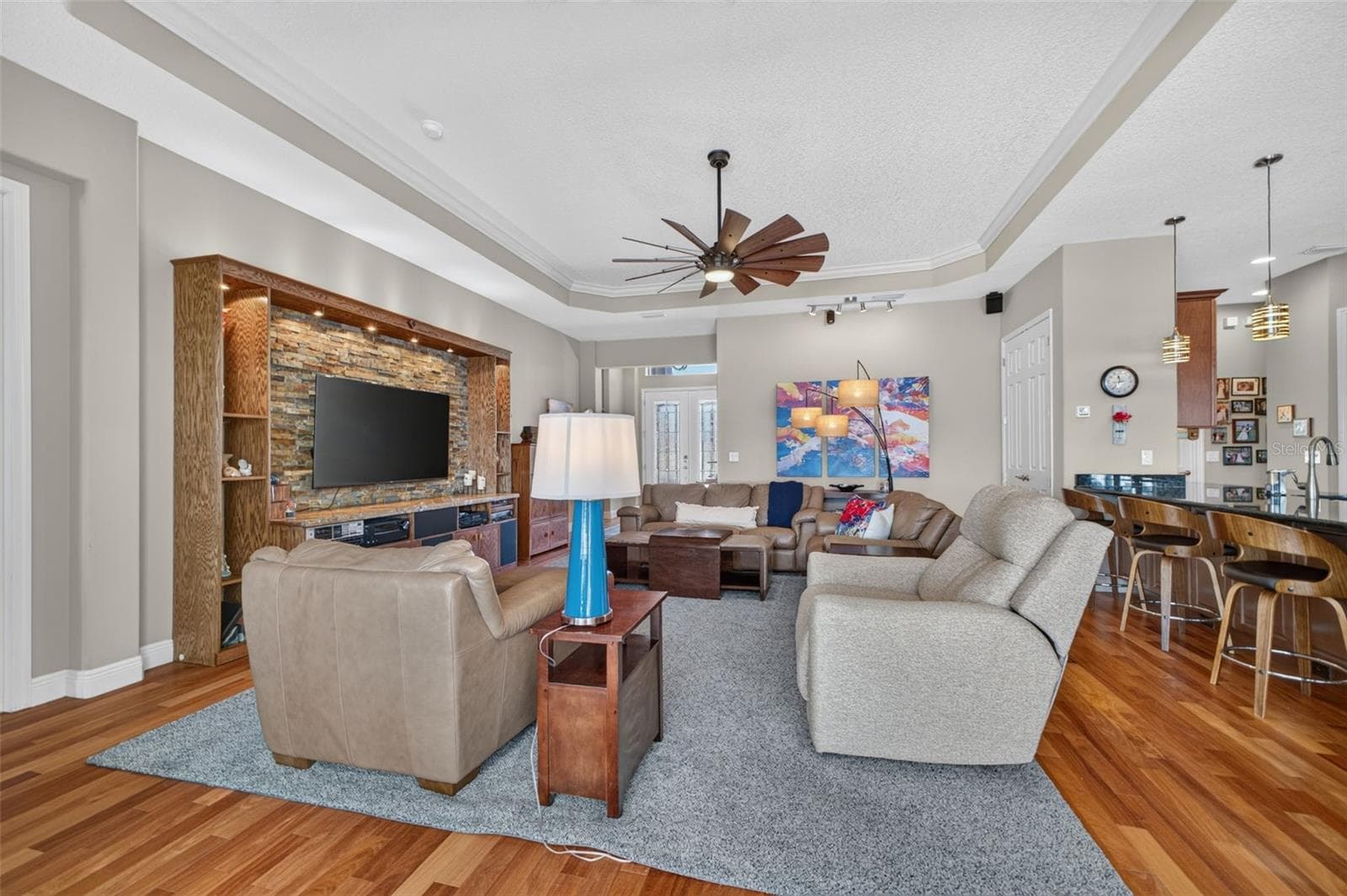 Enjoy seamless indoor-outdoor living with a captivating view of the main living space straight from the patio. - 2444 PAWTUCKET PASS, MOUNT DORA