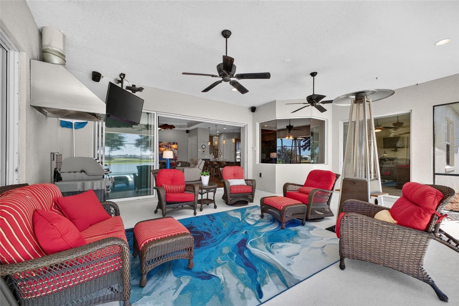 Hours will be spent in the huge lanai that creates a great space to rest after time in the pool. - 2444 PAWTUCKET PASS, MOUNT DORA