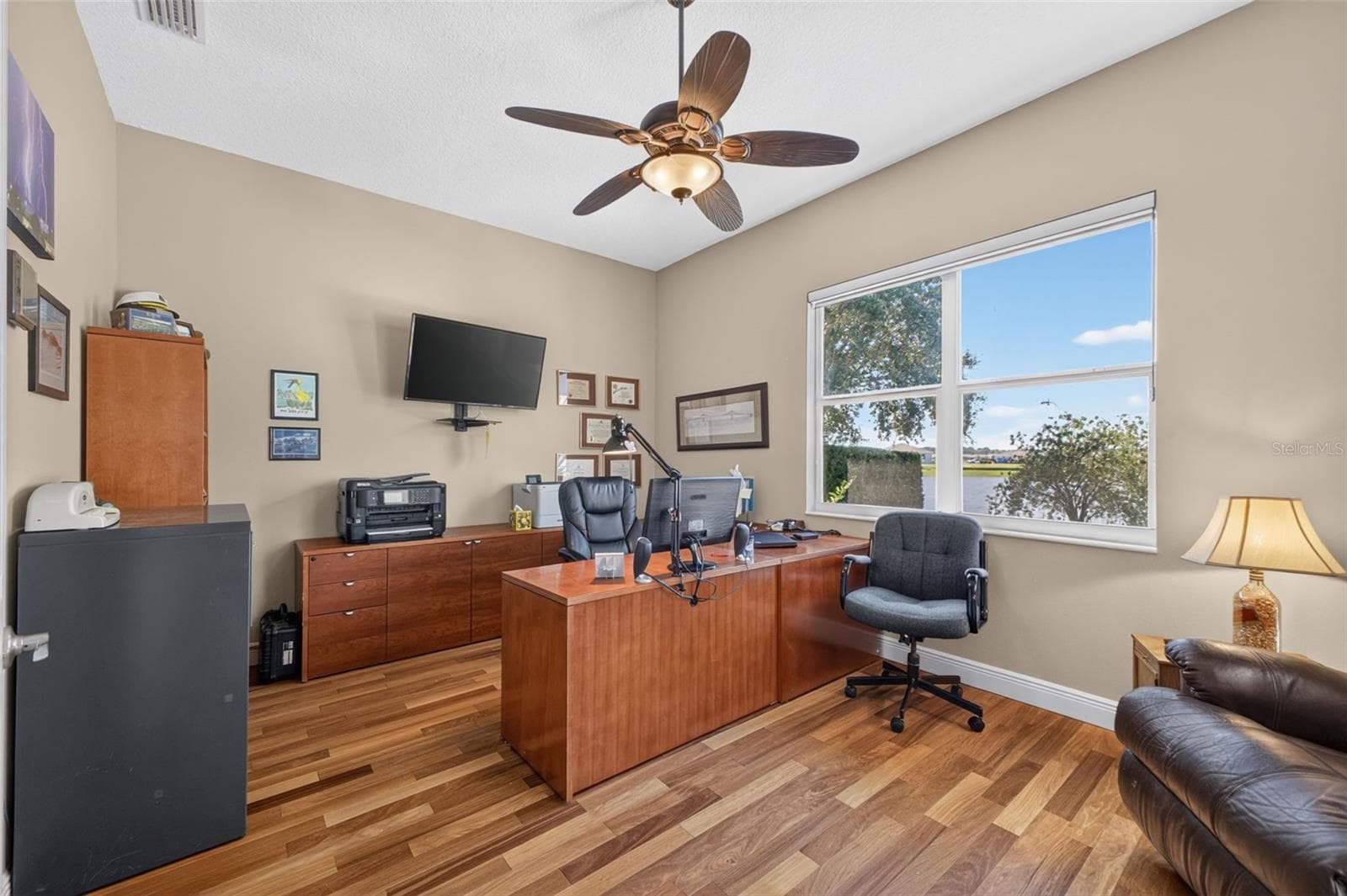 The expansive office offers exceptional flexibility, perfectly suited as a private work-from-home sanctuary, den, or library. - 2444 PAWTUCKET PASS, MOUNT DORA