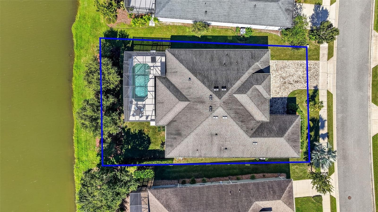Direct overhead aerial view displaying the estimated property boundaries and lot layout. - 2444 PAWTUCKET PASS, MOUNT DORA