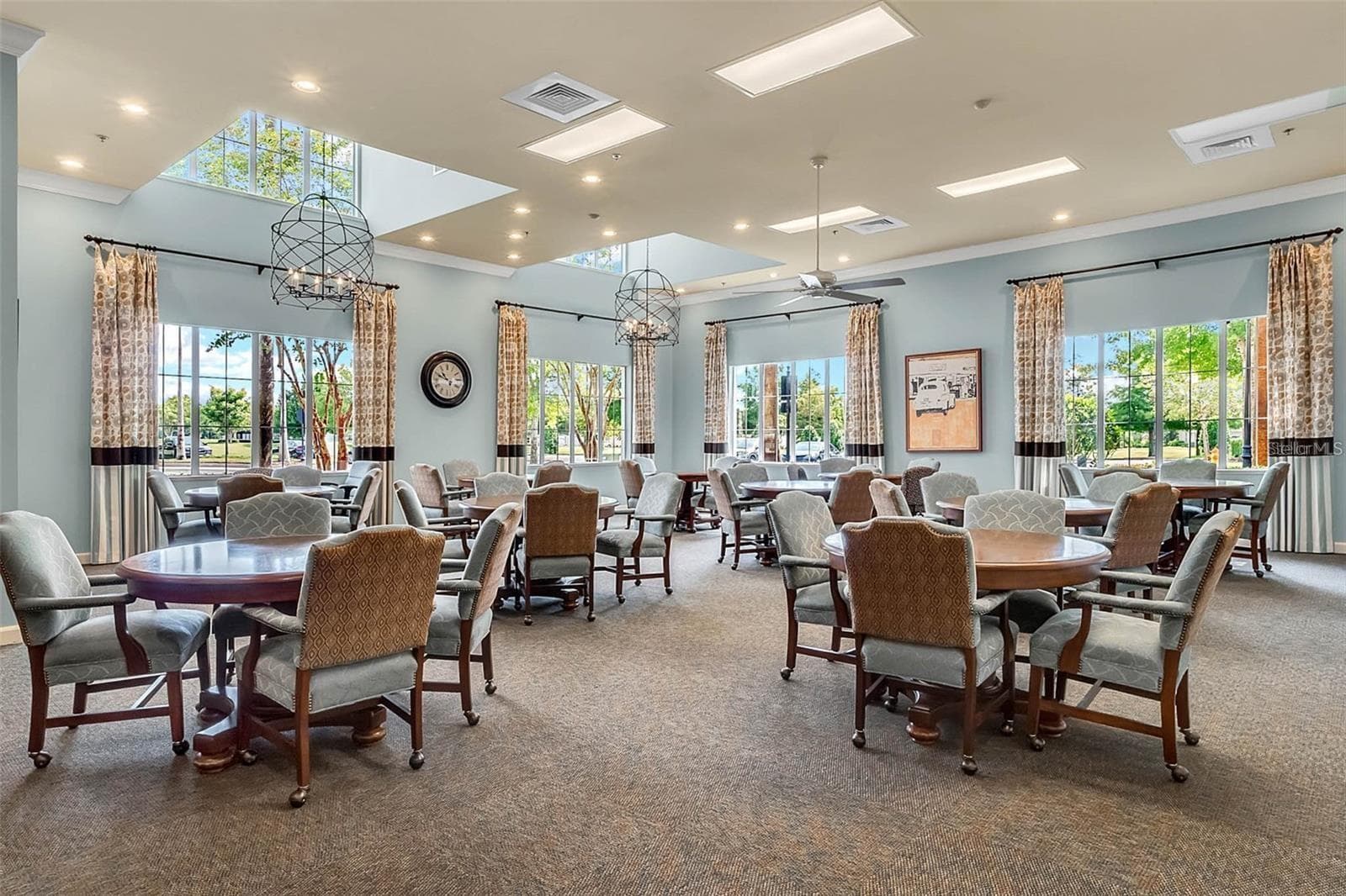 Enjoy friendly competition and social clubs in the climate-controlled card room, complete with dedicated game tables and seating. - 2444 PAWTUCKET PASS, MOUNT DORA