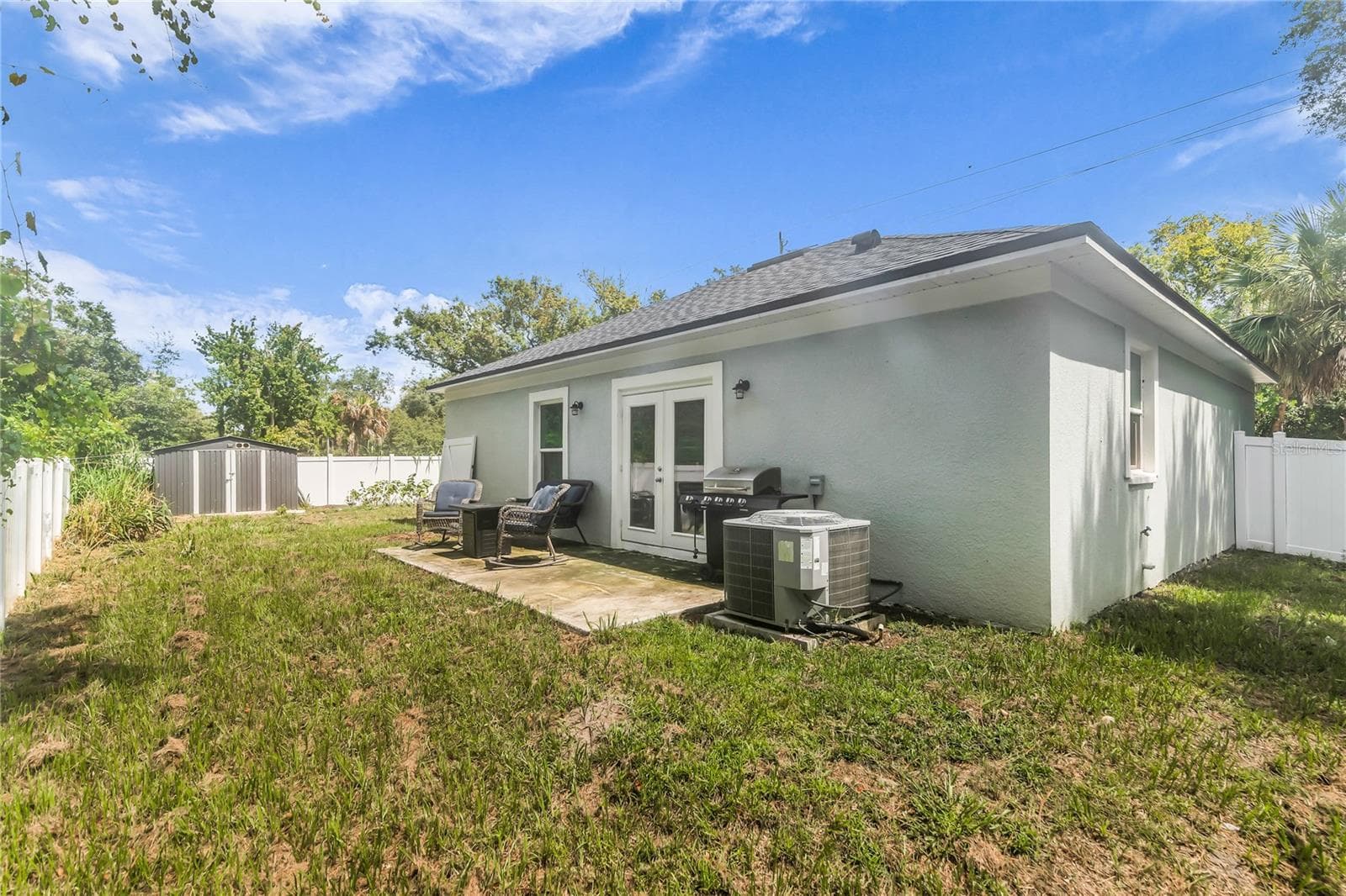 Fully fenced in back yard with storage shed - 3954 S SANFORD AVE, SANFORD