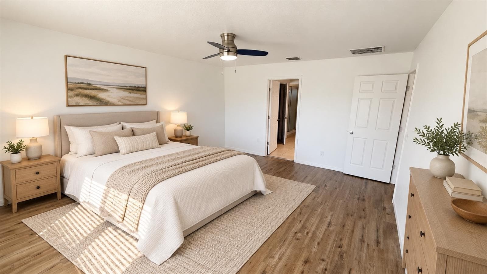 Virtually staged - Primary bedroom. Digital bed, furnishings and decor illustrate a possible layout; furnishings are not included. Original unstaged view included. - 2255 SHEBOYGAN PL, KISSIMMEE