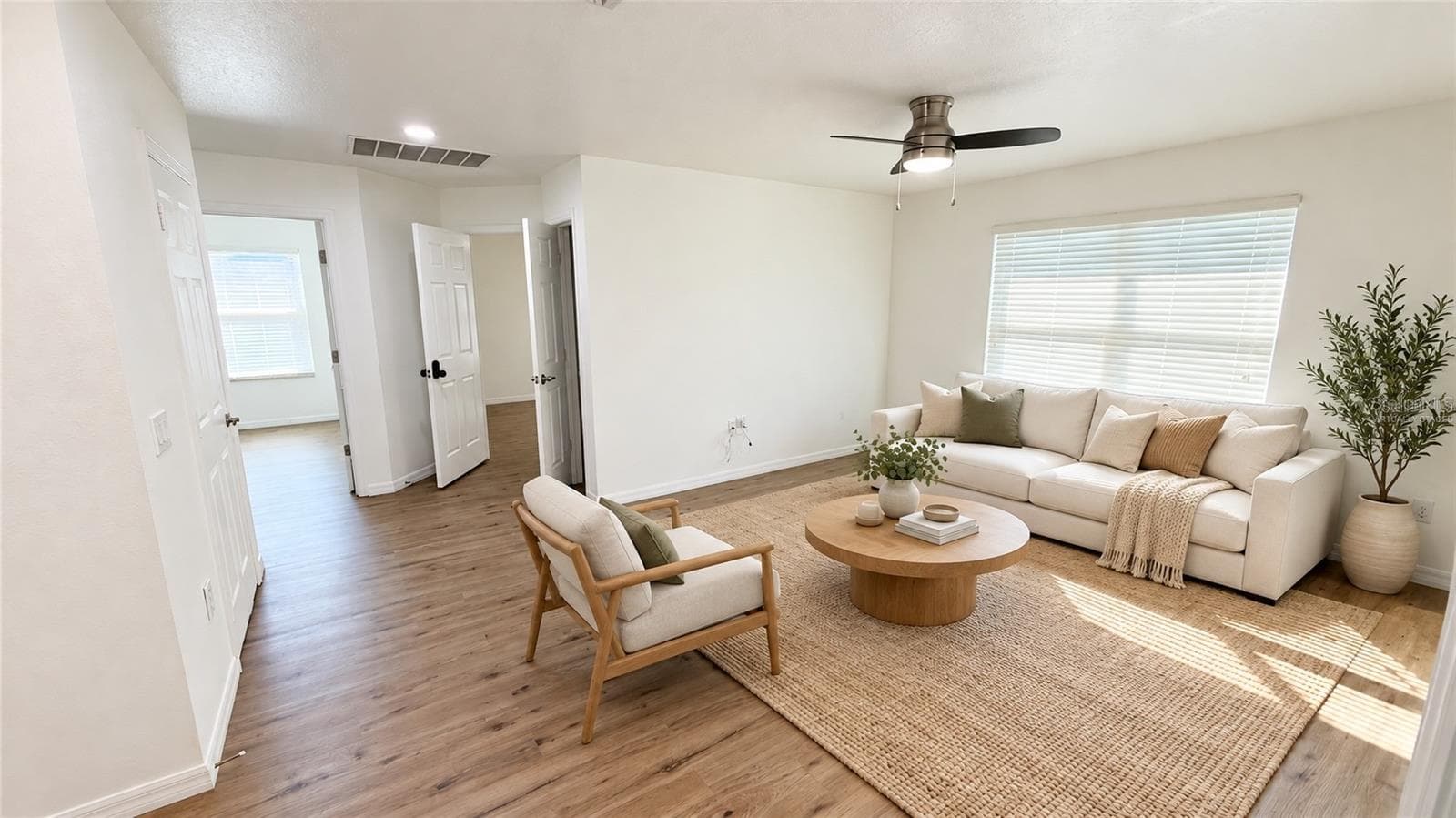 Virtually staged - Upstairs loft shown as a sitting area. Digital furniture and decor; furnishings are not included. Original unstaged view included. - 2255 SHEBOYGAN PL, KISSIMMEE