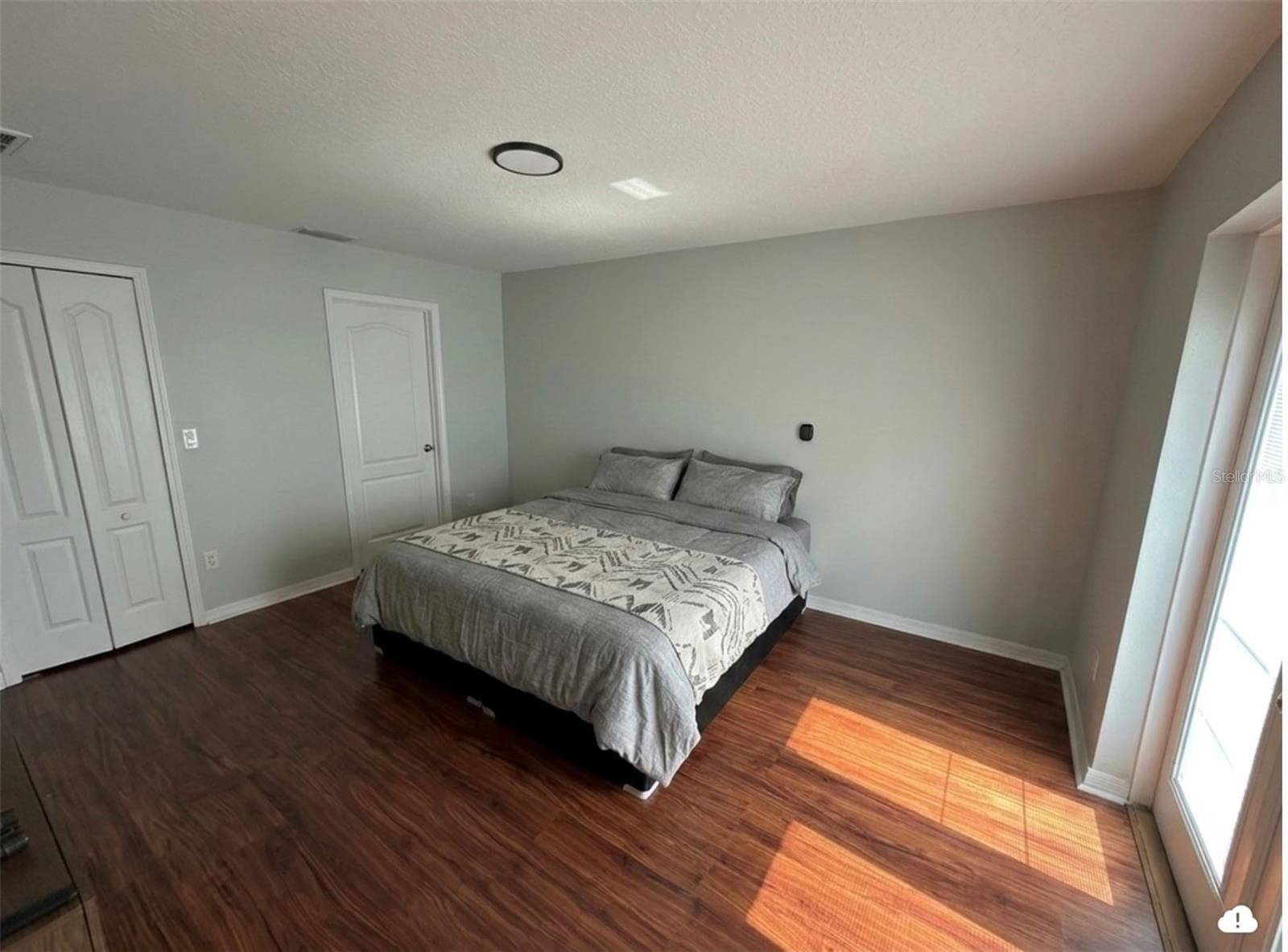 Primary Bedroom (First Floor) - 8103 TAR HOLLOW DR, GIBSONTON