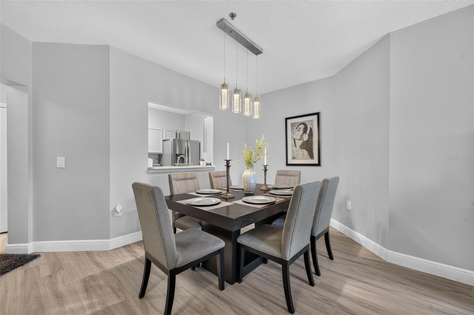 Dining room with pass-through to kitchen - 4849 CYPRESS WOODS DR #1302, ORLANDO
