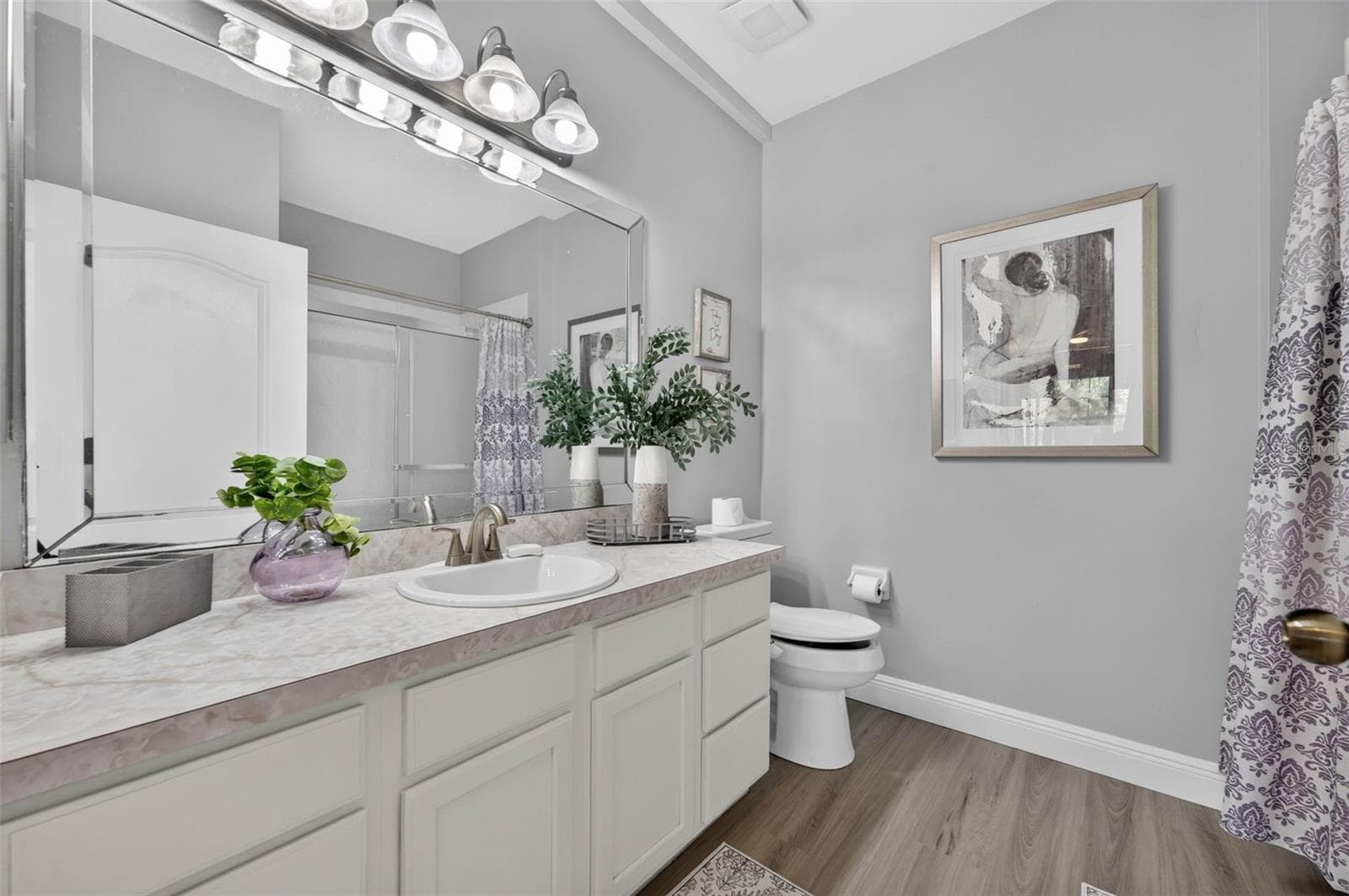 Primary bath with vanity and toilet - 4849 CYPRESS WOODS DR #1302, ORLANDO