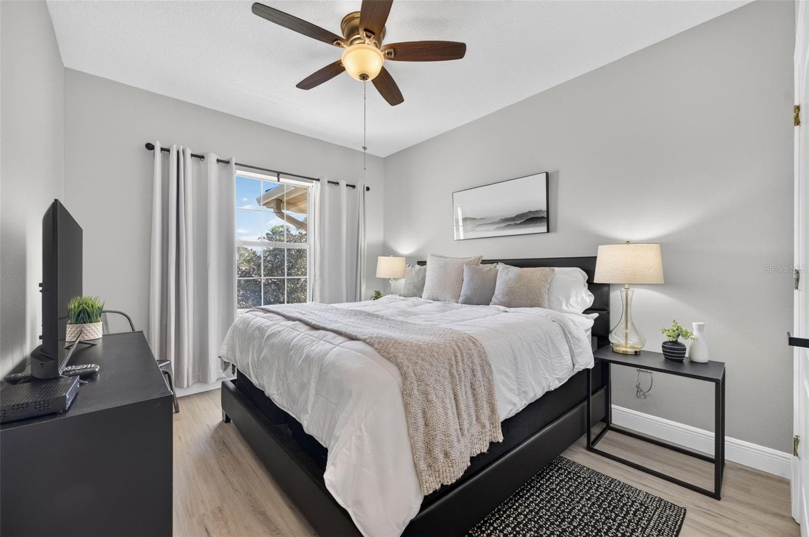 Second bedroom with ceiling fan and walk-in closet - 4849 CYPRESS WOODS DR #1302, ORLANDO
