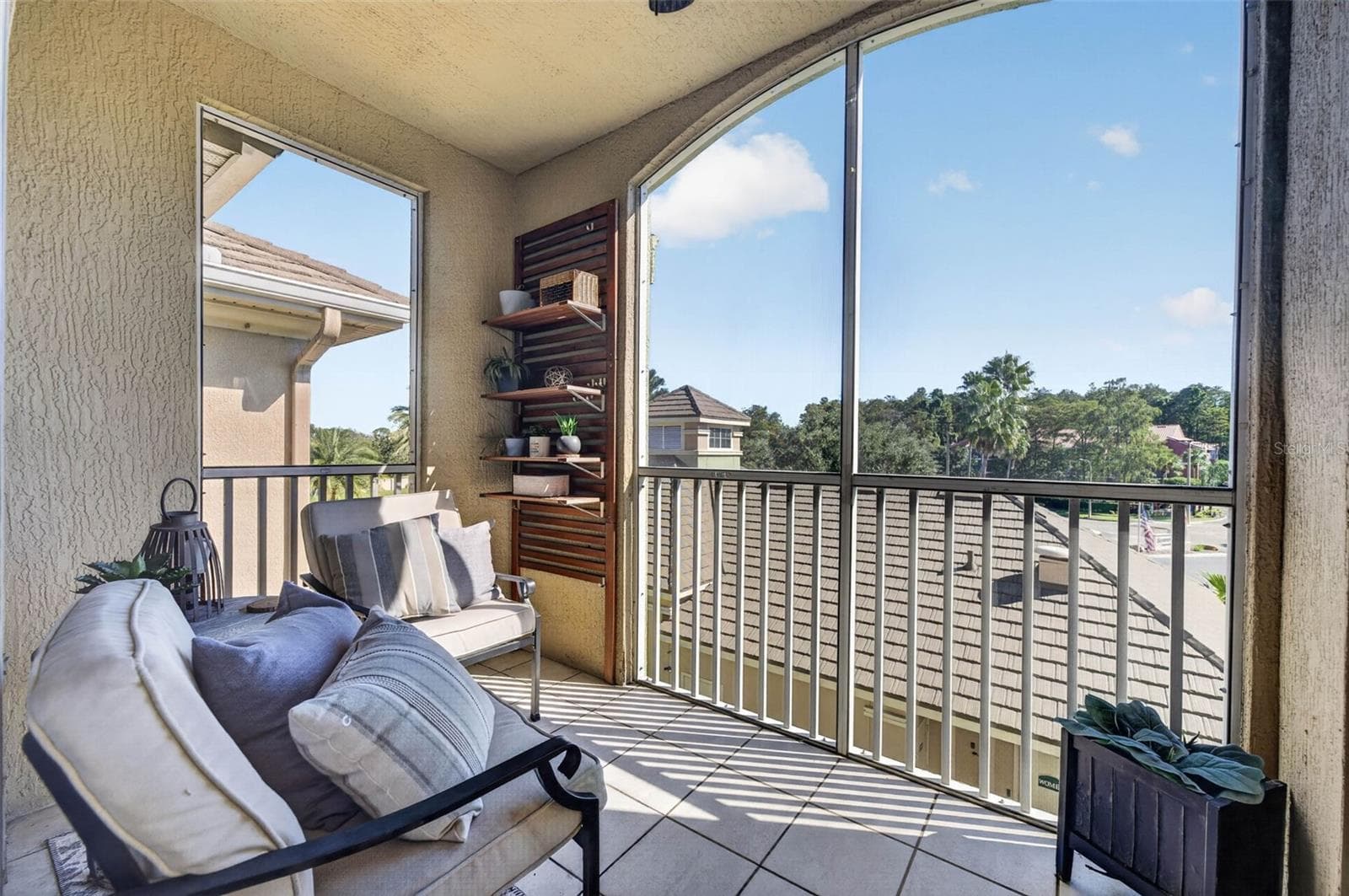 Screened balcony with storage closet and view - 4849 CYPRESS WOODS DR #1302, ORLANDO