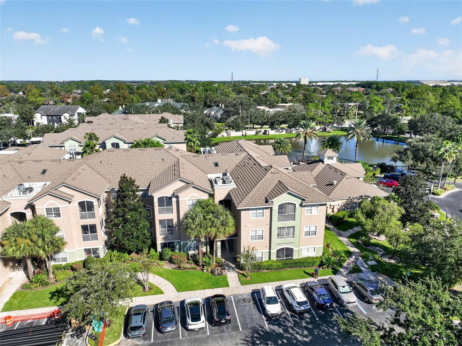 Aerial view of building front and parking - 4849 CYPRESS WOODS DR #1302, ORLANDO