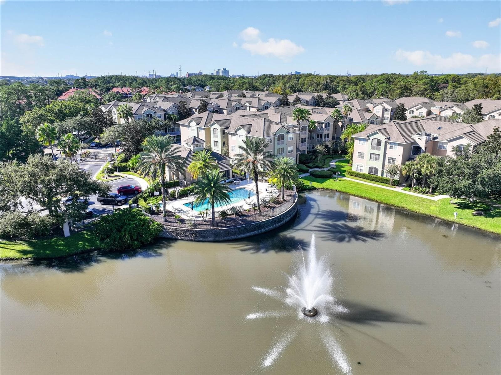 Aerial of community pool and pond fountain - 4849 CYPRESS WOODS DR #1302, ORLANDO