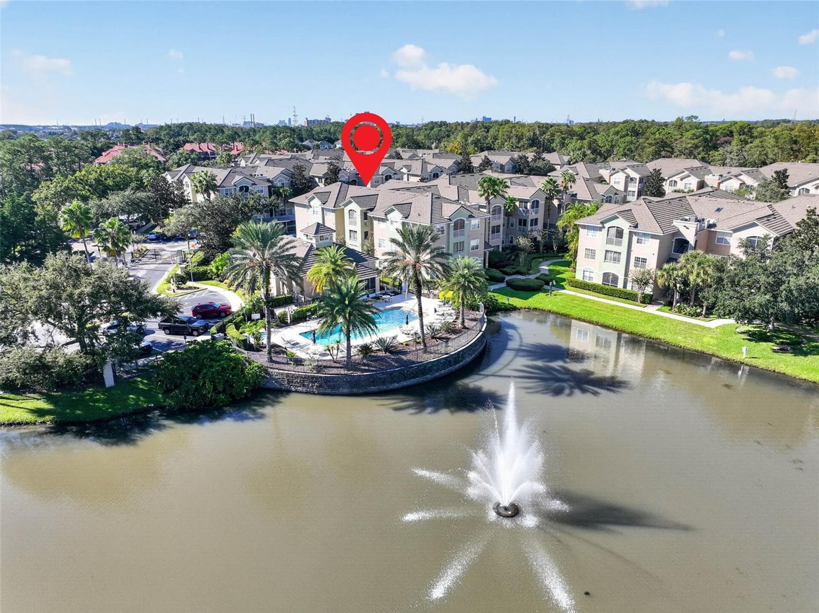 Aerial of pool and fountain with location pin on building - 4849 CYPRESS WOODS DR #1302, ORLANDO