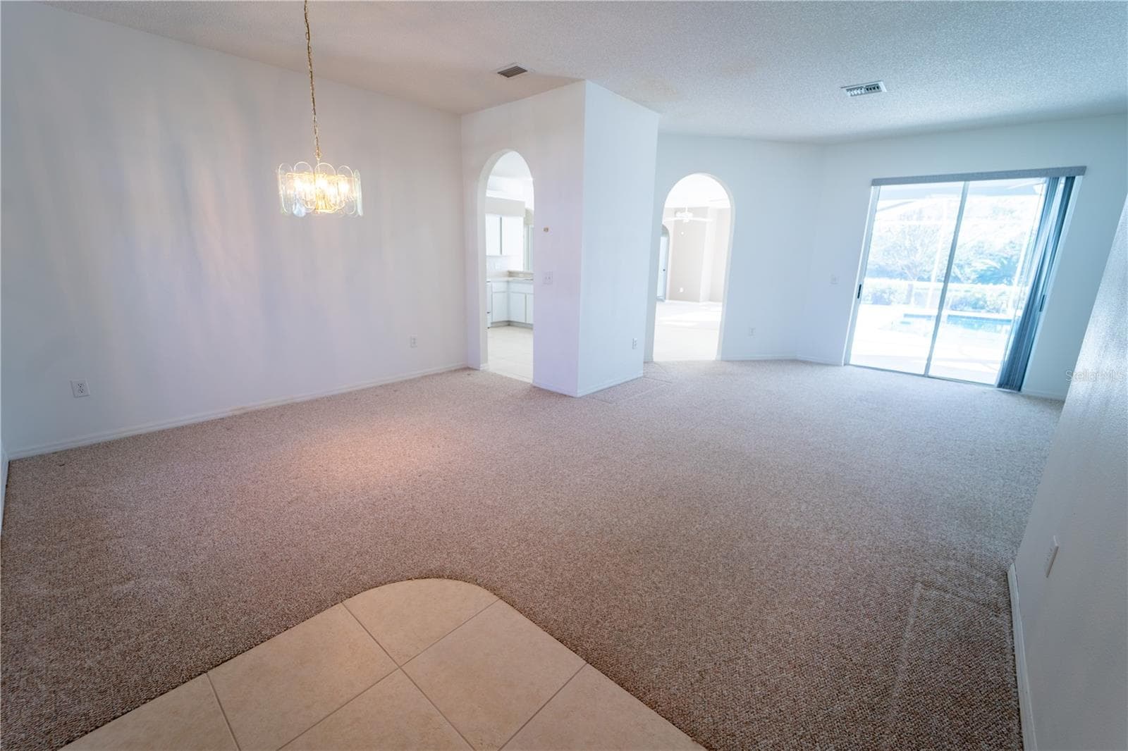 VIEW FROM FRONT DOOR.... FORMAL DINING & LIVING ROOMS - 13023 SAINT FILAGREE DR, RIVERVIEW