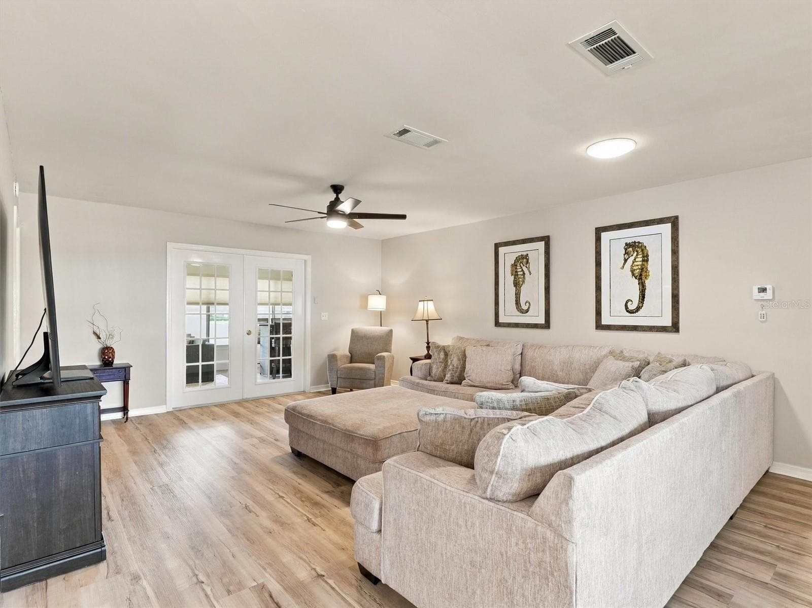 Furnished large living room - 9892 SE 177TH LN, SUMMERFIELD