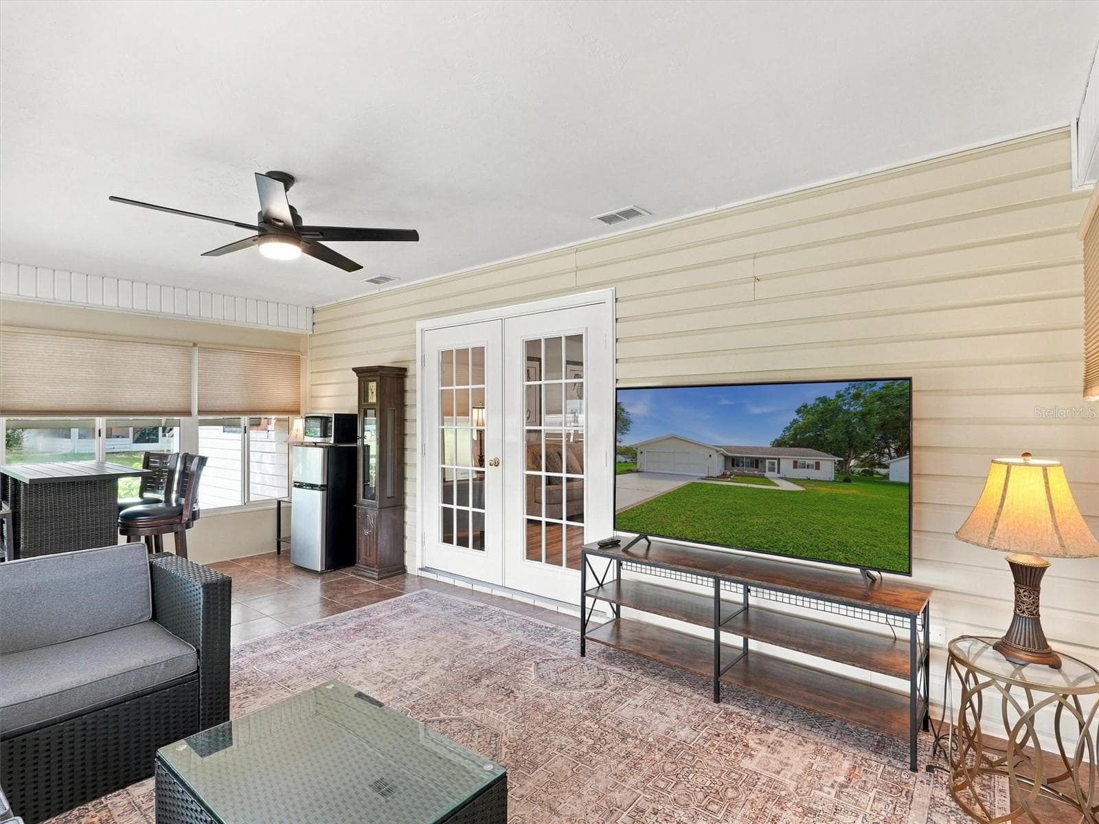Lanai / Den - perfect space for TV room, entertaining all under air - 9892 SE 177TH LN, SUMMERFIELD