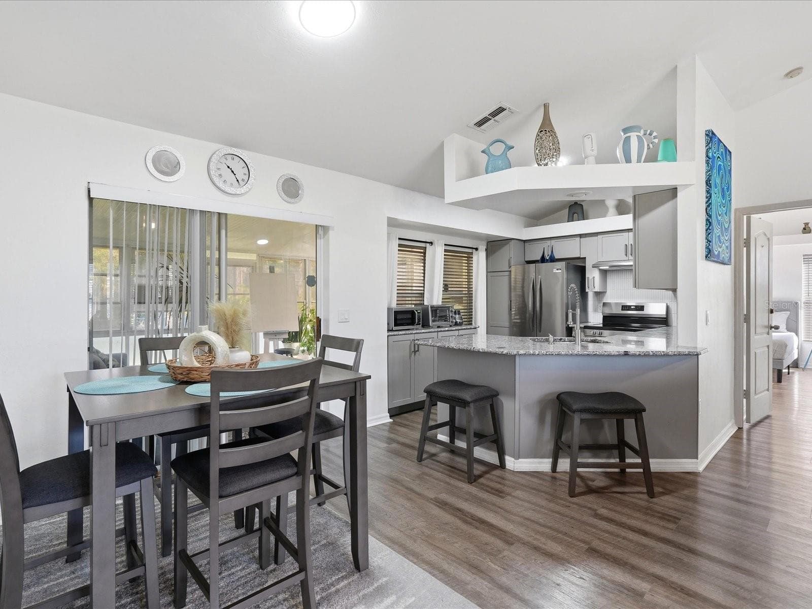 Dining area facing kitchen - 22104 LANDIS AVE, PORT CHARLOTTE