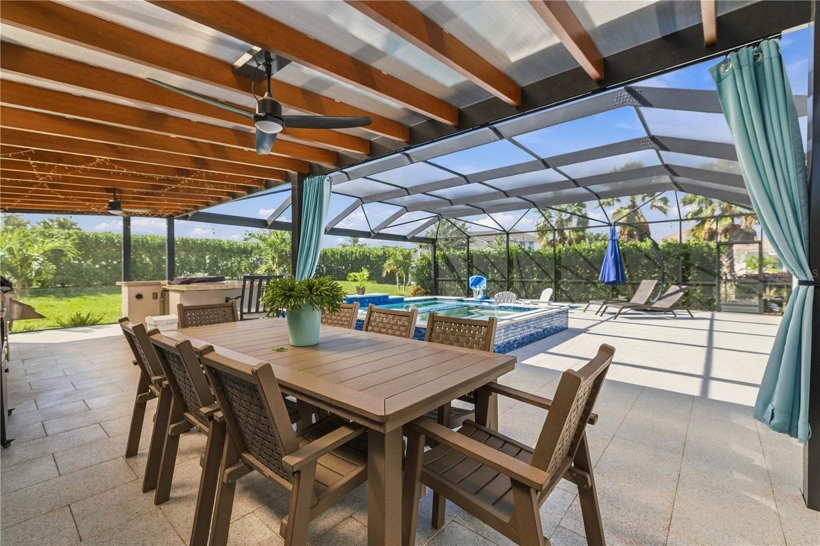 pergola with exquisite outdoor kitchen - 17604 BARLEY DR, LAKEWOOD RANCH
