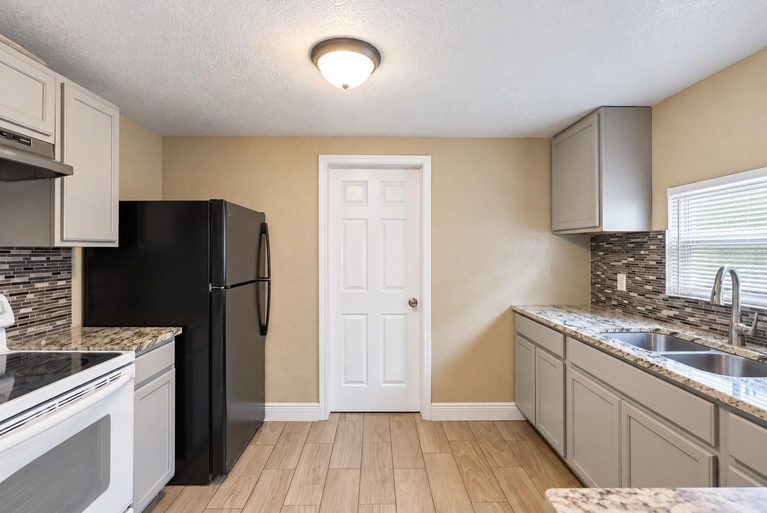 Virtually Staged Empty - 1307 W KALEY AVE, ORLANDO